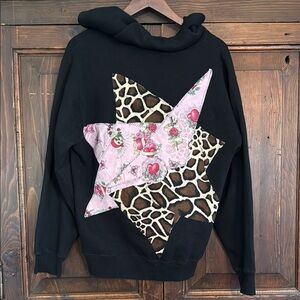 Black Hoodie with Pink and Animal Print Star Patch artwork